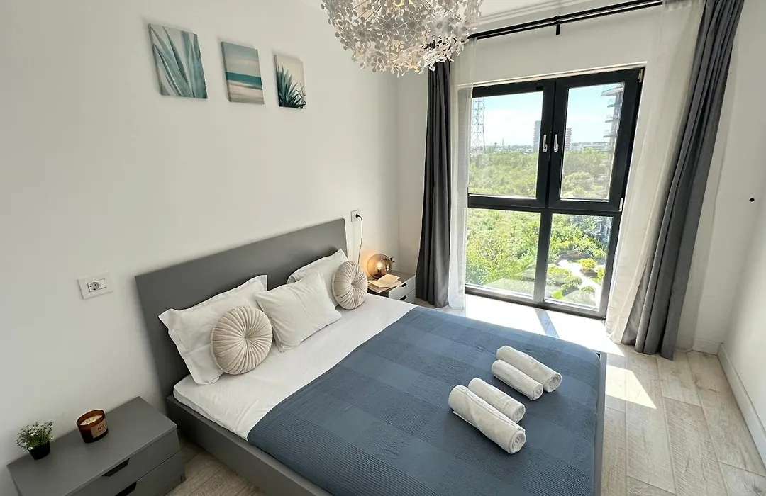 Modern Apartment Near Romexpo With Private Parking And Garden View-1